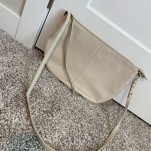 Hobo crossbody bag in off-white